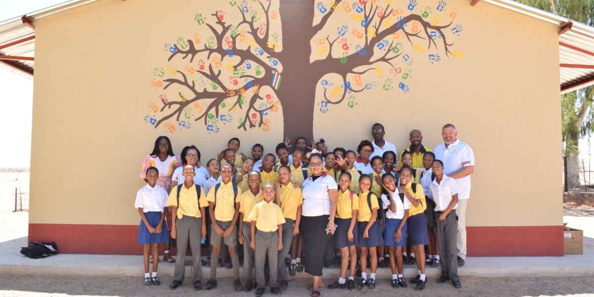 Rössing Uranium, together with its employees, officially handed over N$48,000 for infrastructure upgrades to the Michel Durocher Primary School in the //Karas Region. The school was approached by two Rössing Uranium employees to assess their needs. The mine approved the installation of window glass, painting of window frames, and the creation of a mural on one of the school walls. This donation is part of the mine’s Employee Community Project, an initiative aimed at involving its employees in community projects.