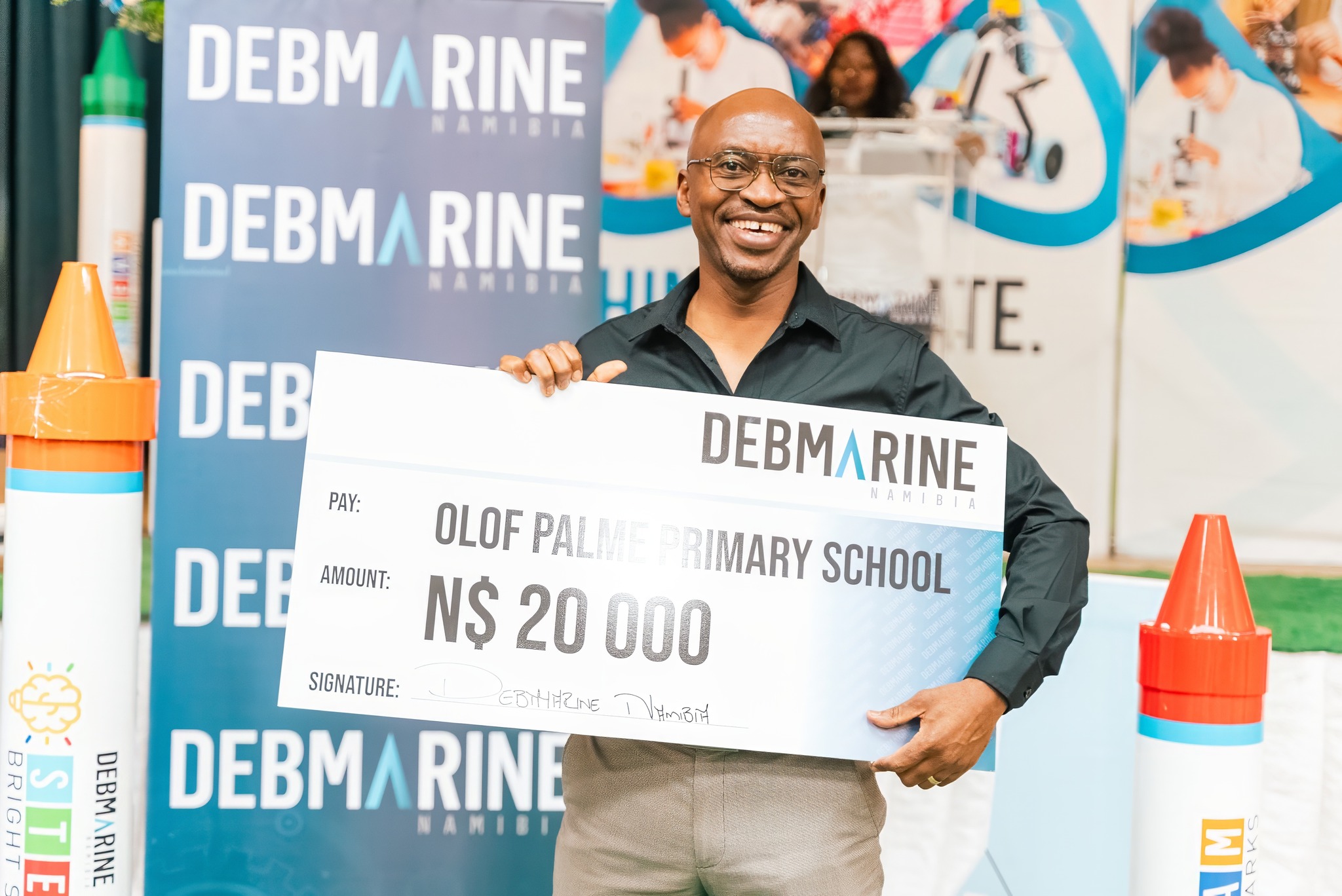 Debmarine Namibia presenting N$20,000 science lab voucher