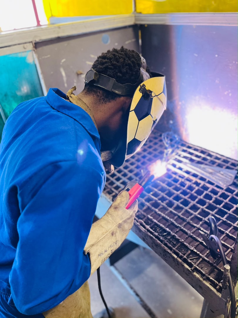 NIMT trainee practising welding with donated equipment