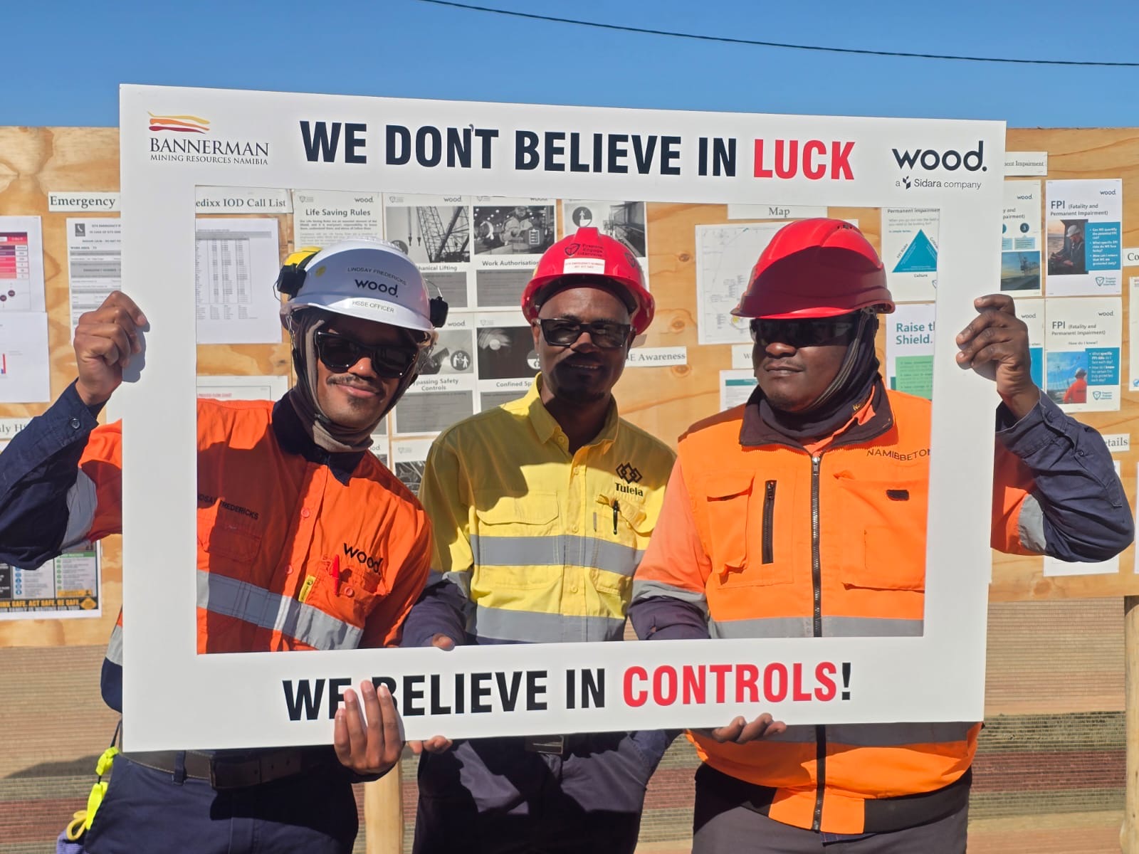 Contractor employees participating in the We Don't Believe in Luck, We Believe in Controls safety campaign